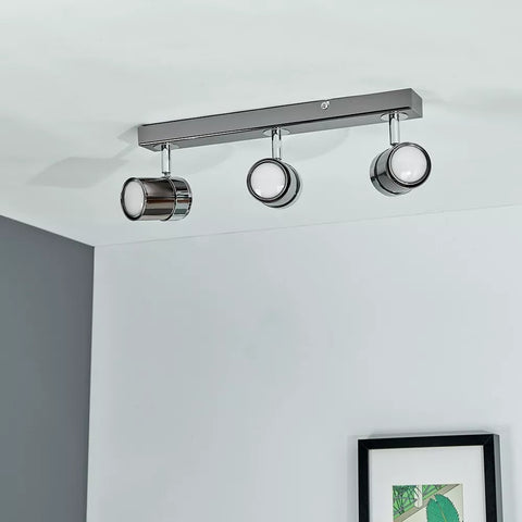 Modern chrome ceiling spotlight with 3 heads
 Modern chrome ceiling spotlight with 3 heads