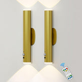 Two gold wall sconces with remote control on a light gray background