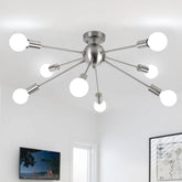 Modern ceiling light fixture with multiple bulbs in a room setting.