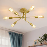 Gold ceiling light fixture with multiple bulbs in a modern living room setting.