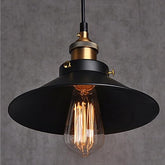 Vintage-style black pendant lamp in a modern loft interior