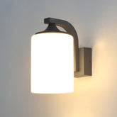 Black die-cast aluminum outdoor wall lamp on brick wall