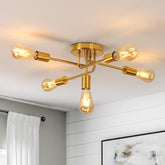 Gold ceiling light fixture with multiple bulbs in a room setting.