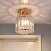 Gold and crystal ceiling light fixture on a ceiling