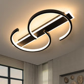Modern ceiling light fixture with circular design in a room setting