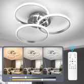 Modern ceiling light fixture with remote control and color temperature display in a living room setting.