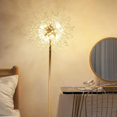 Decorative floor lamp in a bedroom setting with a mirror and chair.