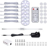 LED strip lights with remote control, power adapter, and accessories on a white background