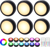 Set of round LED lights with color-changing options and remote control on a white background