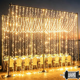 Yowin 600 LED Curtain Lights 6m x 3m Warm White Plug-In Christmas Fairy Lights – Transform Windows, Garden Fences & Party Spaces into a Soft Glow of Festive Magic