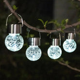 Crackled glass solar lantern lit with white LED