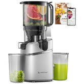 Amzchef juicer with fruits, a glass of green juice, and recipe book on a white background