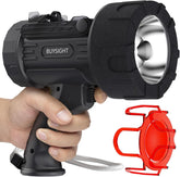 Black flashlight held by a hand with a red car mount attachment on a white background