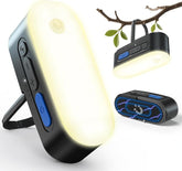 Black portable light with blue buttons and a branch in the background