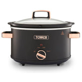 Black slow cooker with rose gold handles and control knob on a white background