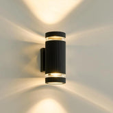 Black wall-mounted outdoor light fixture on a neutral background