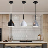 Industrial hanging pendant ceiling lamp over a dining table