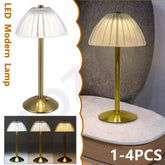 LED modern dimmable cordless table lamp on a bedside table