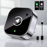 CarPlay and Android Auto device with USB cable on a reflective surface