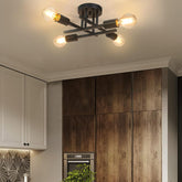 Ceiling light fixture in a kitchen with wooden cabinets and a tiled backsplash.
