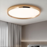 Ceiling light fixture in a room with curtains and a bed.