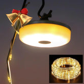 Ceiling light fixture with decorative bell and LED string light coil inset.