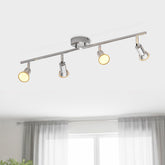 Ceiling light fixture with four lights on a white ceiling