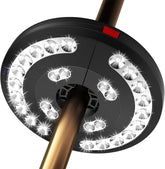 Close-up of a bicycle wheel with reflective studs on a white background