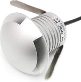 Close-up of a white electronic component with text and a cable on a white background