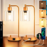 Gold table lamp with USB charging ports on a wooden surface, with inset images showing different light settings.