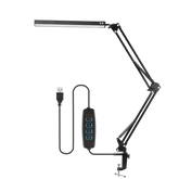 LED Desk Lamp with adjustable swing arm and clamp on a work desk