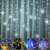 Holiday curtain lights with snowflakes in twinkle mode