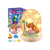 Mermaid night light with packaging and accessories on a white background