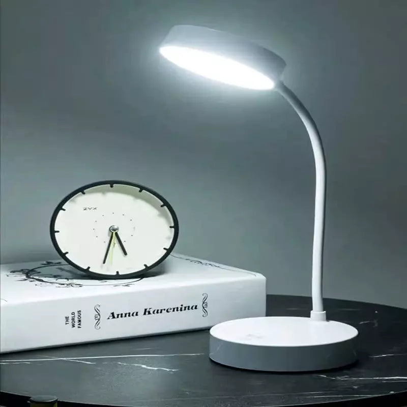 Lamp's flexible gooseneck adjusted for reading