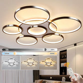 Modern ceiling light fixture with adjustable color temperature control in a home setting.
