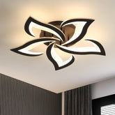 Modern ceiling light fixture with black and white design on a ceiling