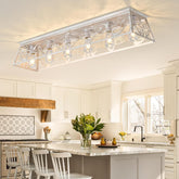 Modern kitchen with a decorative ceiling light fixture.
