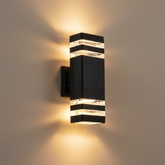 Modern wall-mounted light fixture on a neutral wall