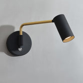 Modern wall lamp with black and gold design on a gray background