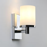 Modern wall lamp with chrome finish and white shade on a gray background