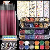 Nail art tool set with pink handles, stencils, rhinestones, and glitter on a black background.