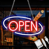 Neon 'OPEN' sign with a blurred city street background