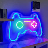 Neon light shaped like a gaming controller on a shelf with a wall thermometer in the background.