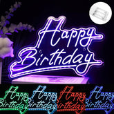 Neon sign with 'Happy Birthday' text in various colors on a dark background.