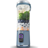 Ninja portable blender with ingredients inside on a white background