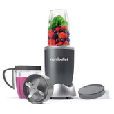 Nutribullet blender with ingredients and accessories on a white background