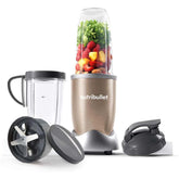 Nutribullet blender with ingredients inside on a white background