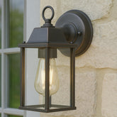 Outdoor wall light fixture on a stone wall