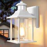 Outdoor wall light fixture with a warm glow, featuring a visible brand logo.