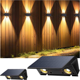 Outdoor wall lights with solar panel on a wooden wall background